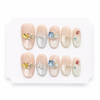 10pcs Blue Nude Cat Eye Press-On Nails, Short Almond Shiny Finish with Rhinestone Accent
