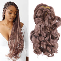 French curl braiding hair in soft brown color on model with long boho box braids and loose curly ends