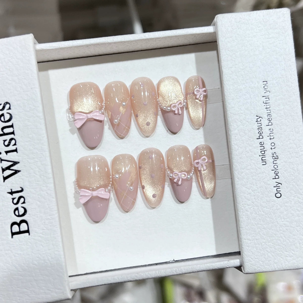 10pcs Handmade Cat Eye Almond Press-On Nails – Light Blue with Bow Accent