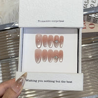 10pcs Handmade Cat Eye Almond Press-On Nails – Light Blue with Bow Accent