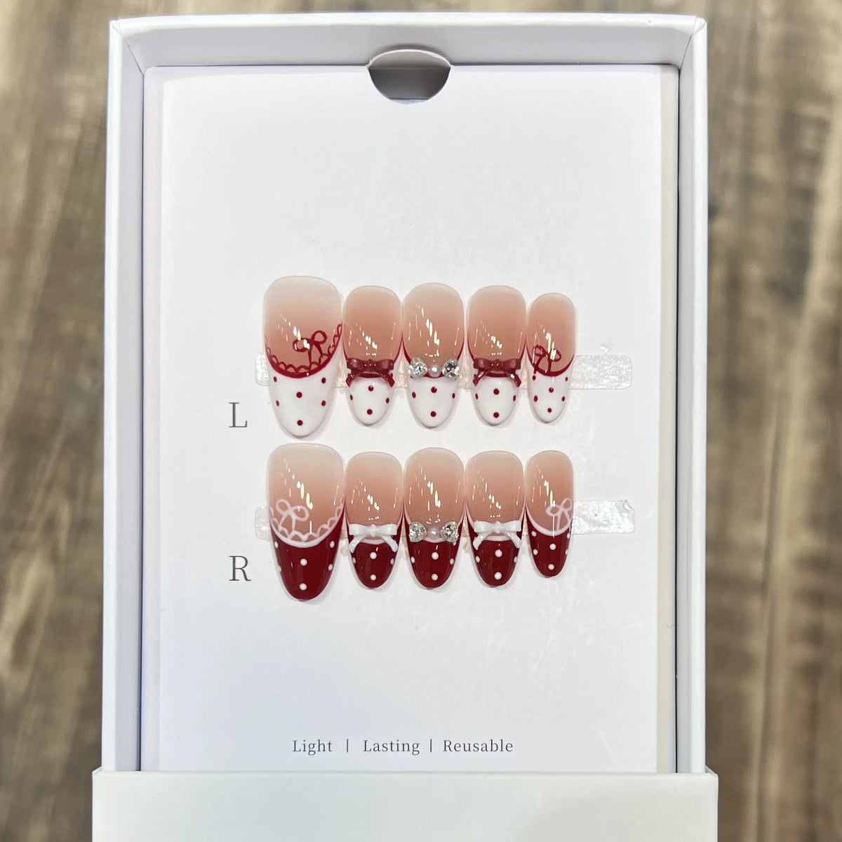 10pcs Handmade Cat Eye Almond Press-On Nails – Light Blue with Bow Accent