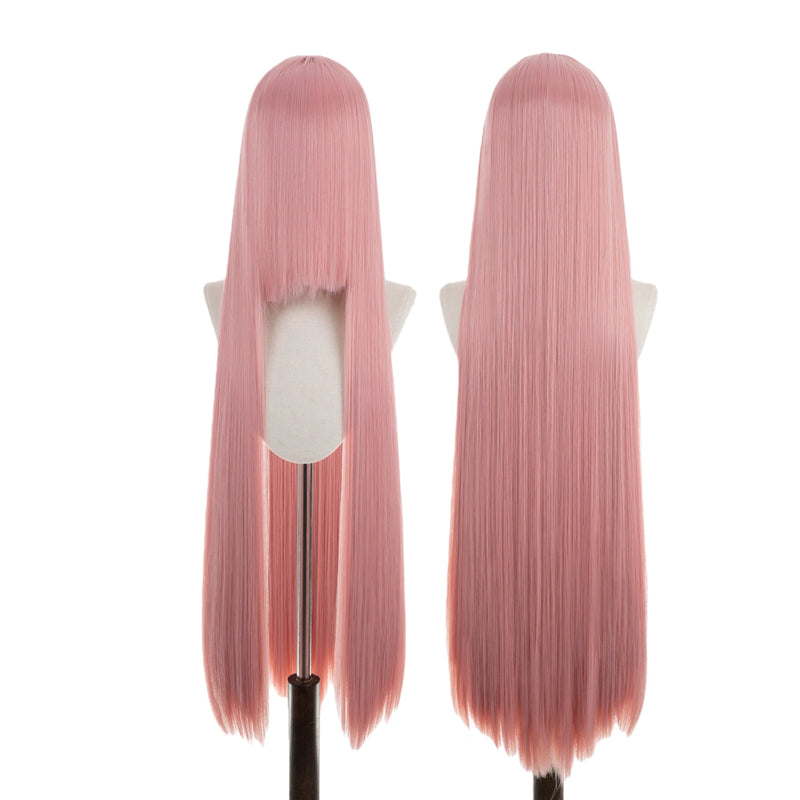 Two pink wigs on mannequin heads against a white background