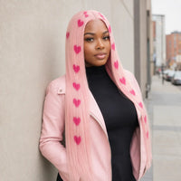 Model wearing pink heart print straight wig in street style look
