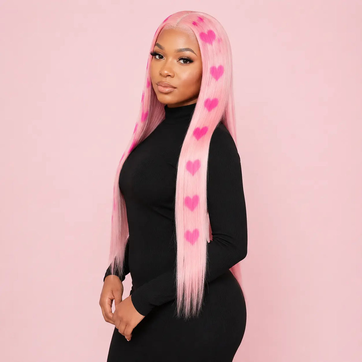 Model wearing pink heart print 26 inch straight wig in studio