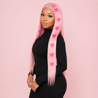 Model wearing pink heart print 26 inch straight wig in studio