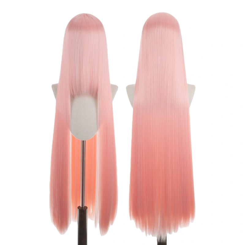 Two pink wigs on mannequin heads against a white background