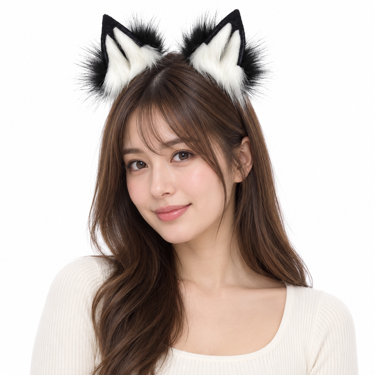 Black and white ears worn by model on white background