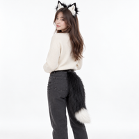 Black and white set worn by model on white background